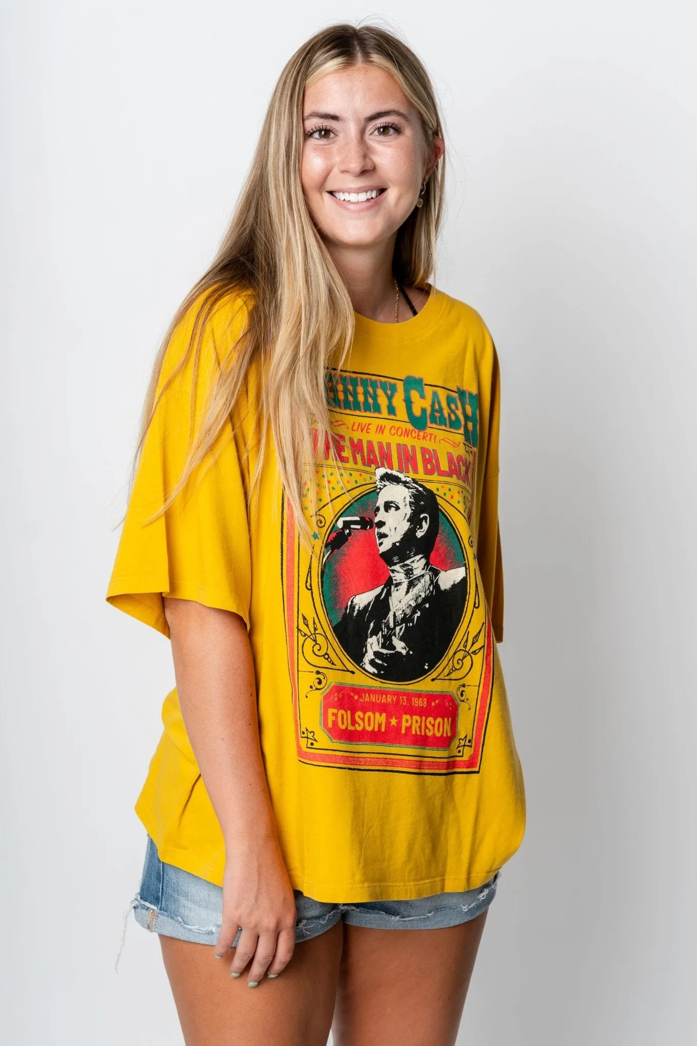 DayDreamer Johnny Cash man in black oversized tee golden daze