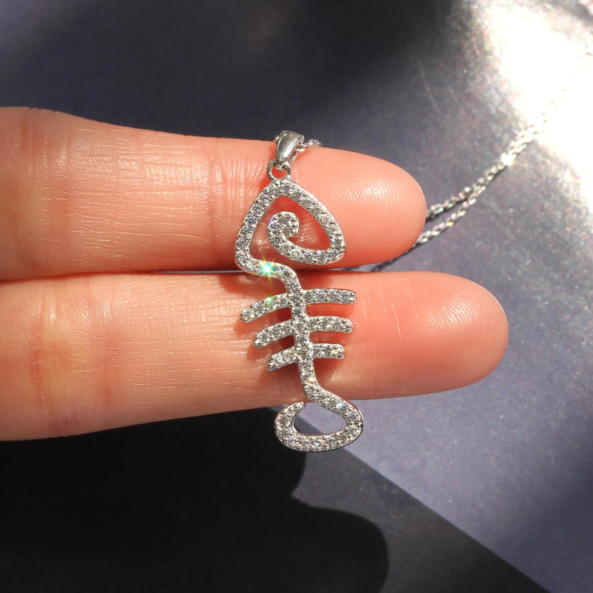 Platinum Gleam Fishbone Ensemble: A Dazzling Earring & Necklace Set